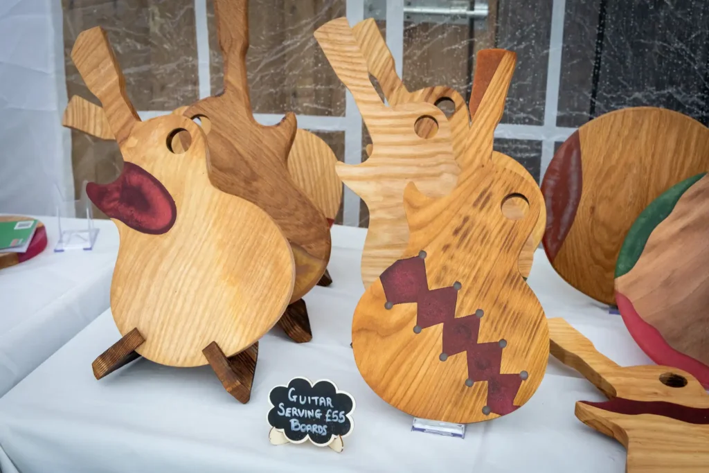 Carved wooden reindeer and decorations at the Ashdon Christmas Market